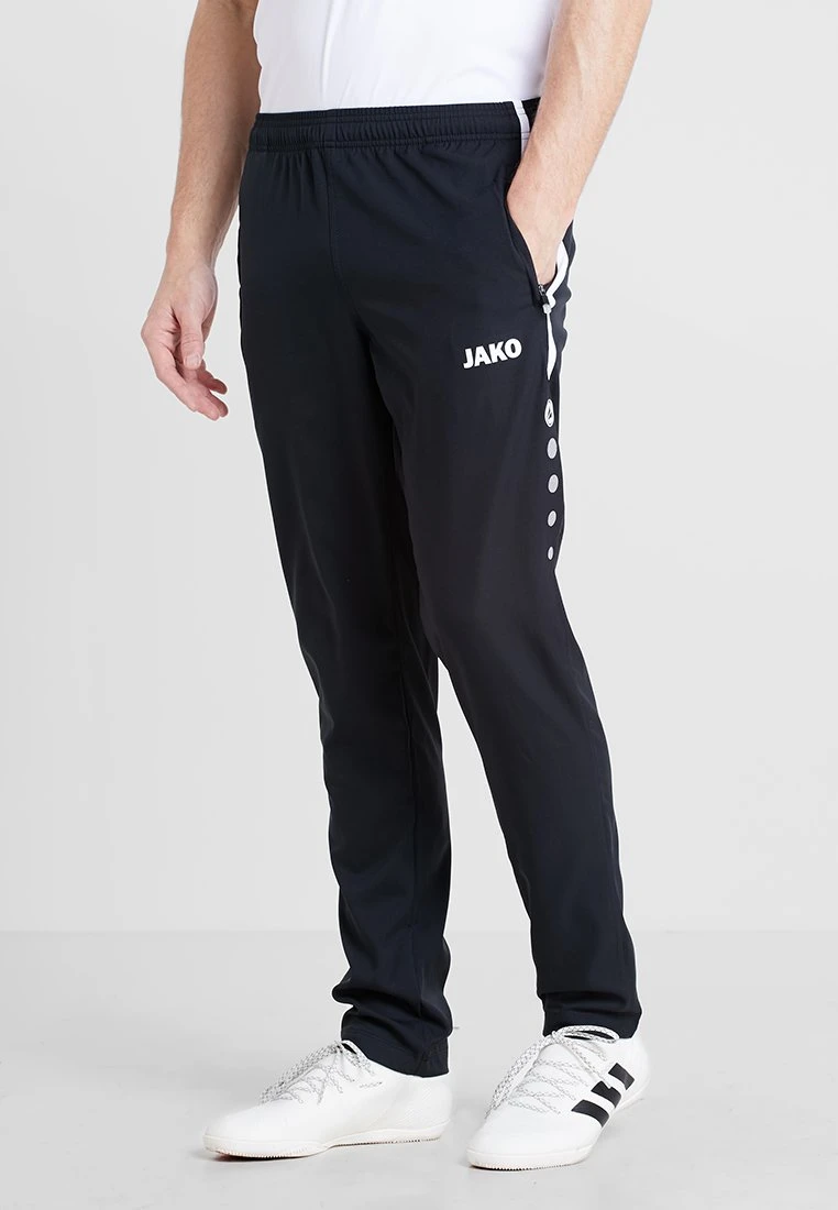 JAKO Striker - Pantaloni Sportivi - Schwarz/Weiß 1 JAKO Striker - Pantaloni Sportivi - Schwarz/Weiß
