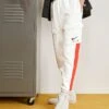 Nike Sportswear Air Pant Pantaloni SportiviSummit White/ Crimson Uomo Pantaloni NI122E0H0-A11